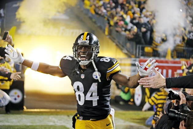 Pittsburgh Steelers wide receiver Antonio Brown (84) is introduced before an NFL wildcard playoff football game against the Baltimore Ravens, Saturday, Jan. 3, 2015, in Pittsburgh. (AP Photo/Gene J. Puskar)