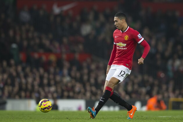 Manchester United's Chris Smalling is seen during the English Premier League soccer match between Manchester United and Hull City at Old Trafford Stadium, Manchester, England, Saturday Nov. 29, 2014. (AP Photo/Jon Super)
