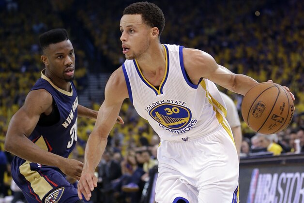 Golden State Warriors' Stephen Curry (30) dribbles past New Orleans Pelicans' Norris Cole during the first half in Game 2 of a first-round NBA basketball playoff series Monday, April 20, 2015, in Oakland, Calif. (AP Photo/Marcio Jose Sanchez)