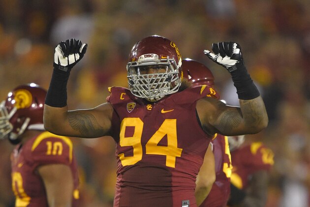 Southern California defensive end Leonard Williams gestures to the crowd during the second half of an NCAA college football game against Oregon State, Saturday, Sept. 27, 2014, in Los Angeles.  USC won the game 35-10. (AP Photo/Mark J. Terrill)