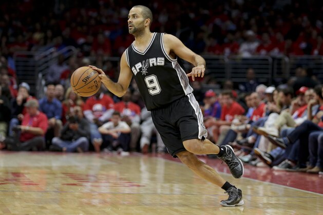 San Antonio Spurs guard Tony Parker plays against the Los Angeles Clippers during the first half of Game 1 of a first-round NBA basketball  playoff series in Los Angeles, Sunday, April 19, 2015. (AP Photo/Chris Carlson)