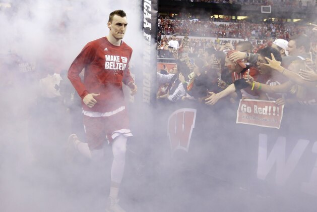 Wisconsin's Sam Dekker runs to the court before the NCAA Final Four college basketball tournament championship game against Duke Monday, April 6, 2015, in Indianapolis. (AP Photo/Michael Conroy)