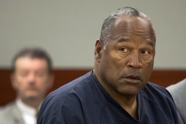 FILE - In this May 16, 2013, file photo, O.J. Simpson listens during an evidentiary hearing in Clark County District Court, in Las Vegas. A judge in Las Vegas rejected Simpson's bid for a new trial on Tuesday, Nov. 26, 2013, dashing the former football star's bid for freedom based on the claim that his original lawyer botched his armed robbery and kidnapping trial in Las Vegas more than five years ago. (AP Photo/Julie Jacobson, Pool, File)