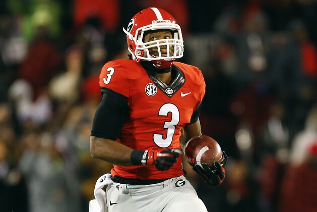 Georgia's Todd Gurley (3) returns a kickoff for a touchdown asagainst Auburn  in the first half of an NCAA college football game Saturday, Nov. 15, 2014, in Athens, Ga. The touchdown was called back due to a holding penalty. (AP Photo/John Bazemore)