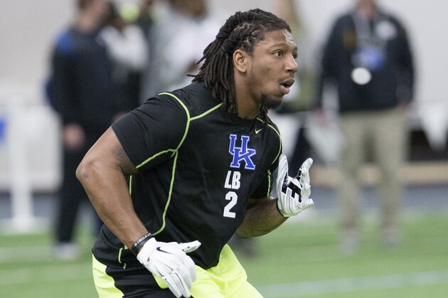 Bud Dupree runs through drills during NFL football Pro Day at the University of Kentucky in Lexington, Ky., Thursday, March 12, 2015. (AP Photo/David Stephenson)