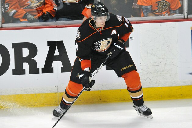 April 16, 2015; Anaheim, CA, USA; Anaheim Ducks right wing Corey Perry (10) controls the puck against the Winnipeg Jets during the third period in game one of the first round of the the 2015 Stanley Cup Playoffs at Honda Center. Mandatory Credit: Gary A. Vasquez-USA TODAY Sports