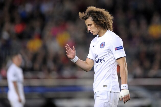 PSG's David Luiz reacts at the end of the Champions League quarterfinal second leg soccer match between FC Barcelona and Paris Saint Germain at the Camp Nou Stadium in Barcelona, Spain, Tuesday, April 21, 2015. Barcelona won 2-0. (AP Photo/Manu Fernandez)