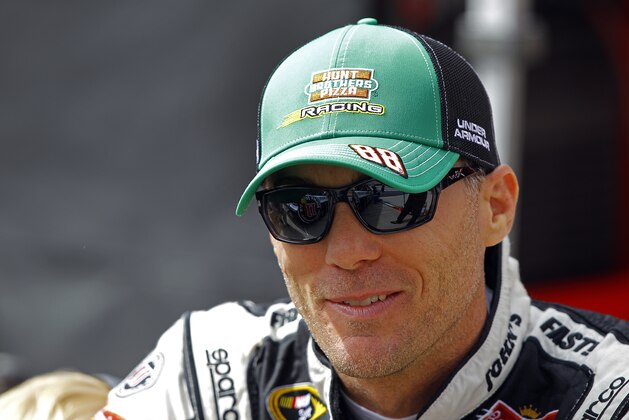 Driver Kevin Harvick before practice for a NASCAR Sprint Cup Series auto race at Bristol Motor Speedway on Friday, April 17, 2015, in Bristol, Tenn. (AP Photo/Wade Payne)