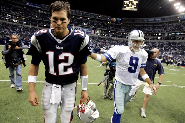 New England Patroits quarterback Tom Brady (12) and Dallas Cowboys quarterback Tony Romo (9) walk off the field after the Patriots beat the Cowboys 48-27 in their NFL football game, Sunday, Oct. 14, 2007, in Irving, Texas. (AP Photo/LM Otero)