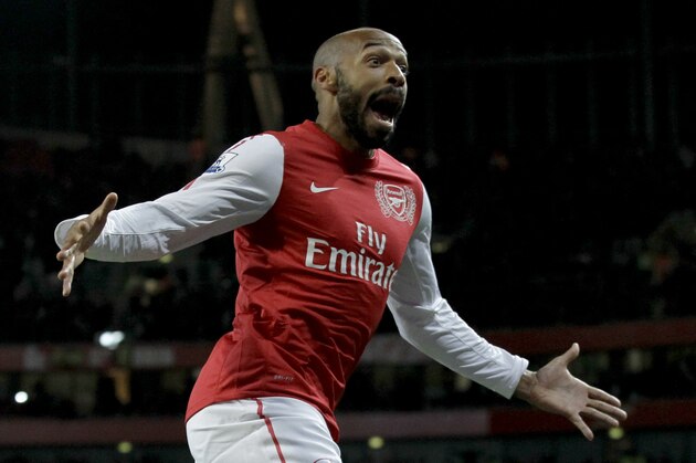 Arsenal's former player and new loan signing Thierry Henry celebrates scoring on his first game back during the English FA Cup 3rd round soccer match between Arsenal and Leeds United at the Emirates Stadium in London, Monday, Jan. 9, 2012.  (AP Photo/Matt Dunham)