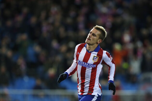 Atletico's Antoine Griezmann celebrates his goal during a Spanish La Liga soccer match between Atletico Madrid and Rayo Vallecano at the Vicente Calderon stadium in Madrid, Spain, Saturday, Jan. 24, 2015. (AP Photo/Andres Kudacki)