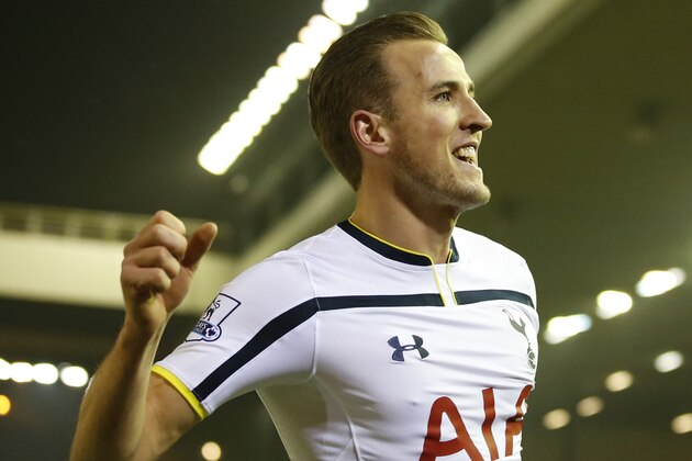 Tottenham's Harry Kane celebrates scoring during the English Premier League soccer match between Liverpool and Tottenham Hotspur at Anfield Stadium, Liverpool, England, Tuesday Feb. 10, 2015. (AP Photo/Jon Super)
