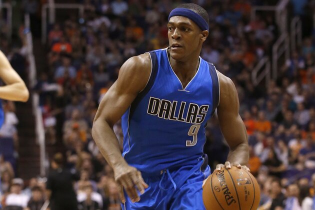 Dallas Mavericks guard Rajon Rondo drives against the Phoenix Suns in the first quarter during an NBA basketball game, Sunday, March 22, 2015, in Phoenix. (AP Photo/Rick Scuteri)