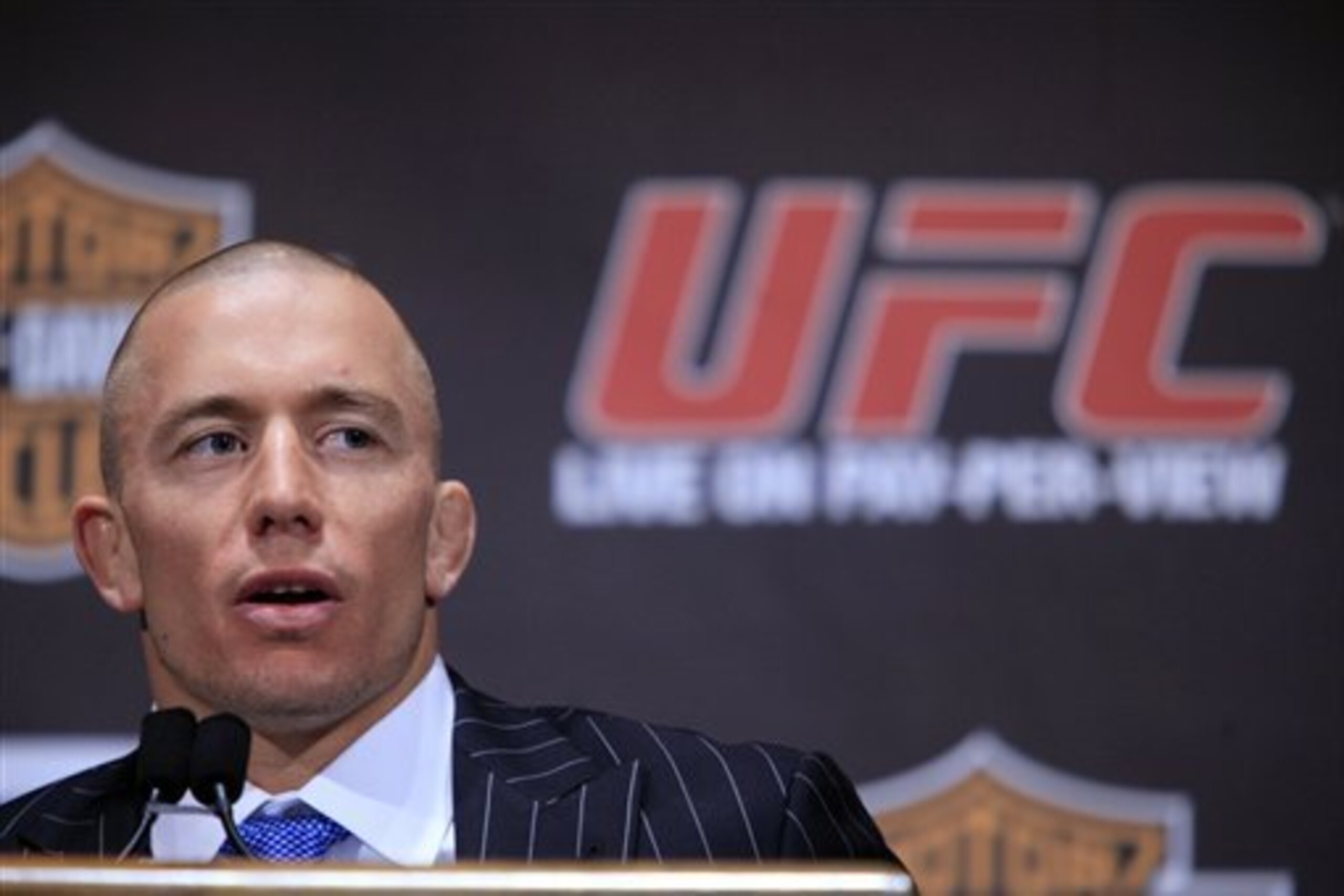 Georges St. Pierre speaks to reporters during a news conference at Radio City Music Hall, Wednesday, March 24, 2010 in New York.  St. Pierre and Dan Hardy are scheduled to meet Saturday in Newark, N.J., in UFC 111 for St. Pierre's mixed martial arts title. (AP Photo/Mary Altaffer)
