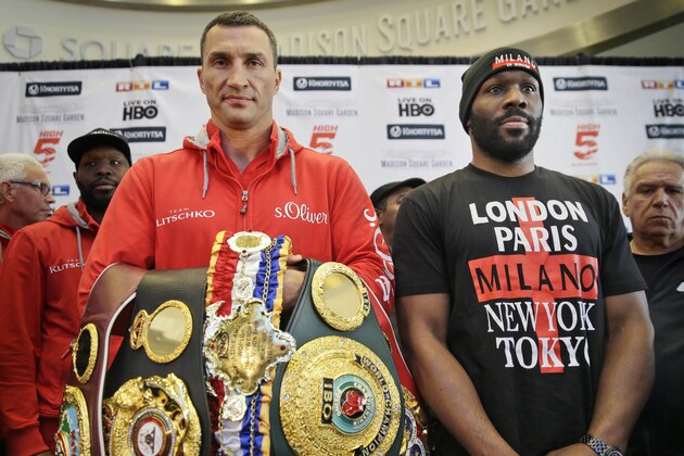 Boxers Wladimir Klitschko, left, and Bryant Jennings pose for a picture during a news conference in New York, Tuesday, April 21, 2015. Klitschko will defend his heavyweight titles against Jennings on April 25, at Madison Square Garden in New York. (AP Photo/Seth Wenig)