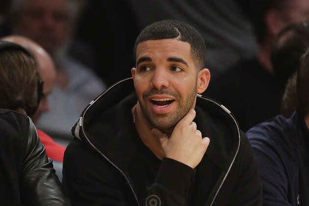Rapper Drake attends an NBA basketball game between the Los Angeles Lakers and the Toronto Raptors Sunday, Nov. 30, 2014, in Los Angeles. (AP Photo/Jae C. Hong)