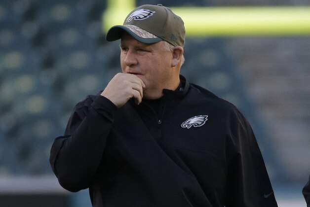 Philadelphia Eagles head coach Chip Kelly watches warm up before an NFL football game against the Seattle Seahawks, Sunday, Dec. 7, 2014, in Philadelphia. (AP Photo/Michael Perez)