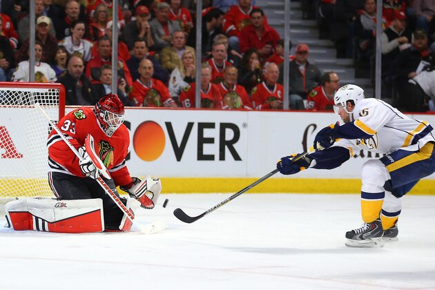 Apr 21, 2015; Chicago, IL, USA; Chicago Blackhawks goalie Scott Darling (33) makes a save on a shot from Nashville Predators center Craig Smith (15) during the second period in game four of the first round of the 2015 Stanley Cup Playoffs at the United Center. Mandatory Credit: Dennis Wierzbicki-USA TODAY Sports