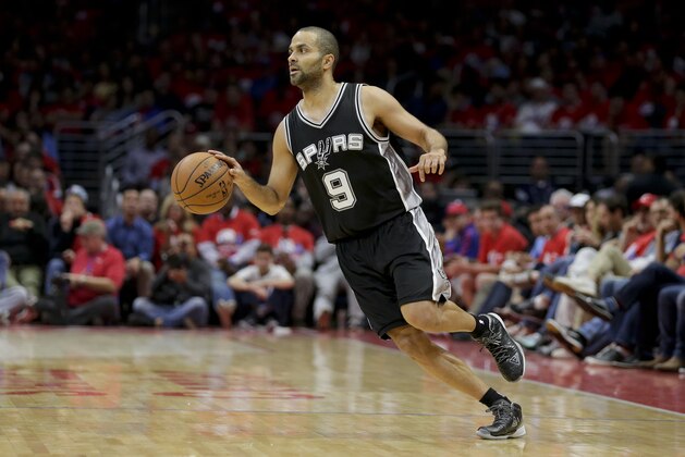 San Antonio Spurs guard Tony Parker plays against the Los Angeles Clippers during the first half of Game 1 of a first-round NBA basketball  playoff series in Los Angeles, Sunday, April 19, 2015. (AP Photo/Chris Carlson)