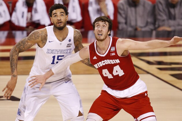 Apr 4, 2015; Indianapolis, IN, USA; Kentucky Wildcats forward Willie Cauley-Stein (15) and Wisconsin Badgers forward Frank Kaminsky (44) watch a shot during the second half of the 2015 NCAA Men's Division I Championship semi-final game at Lucas Oil Stadium. Mandatory Credit: Brian Spurlock-USA TODAY Sports Apr 4, 2015; Indianapolis, IN, USA; Kentucky Wildcats forward Willie Cauley-Stein (15) and Wisconsin Badgers forward Frank Kaminsky (44) watch a shot during the second half of the 2015 NCAA Men's Division I Championship semi-final game at Lucas Oil Stadium. Mandatory Credit: Brian Spurlock-USA TODAY Sports