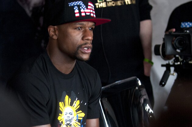 Apr 14, 2015; Las Vegas, NV, USA; Floyd Mayweather Jr., answers questions from reporters before training at Mayweather Boxing Club. Mandatory Credit: Stephen R. Sylvanie-USA TODAY Sports