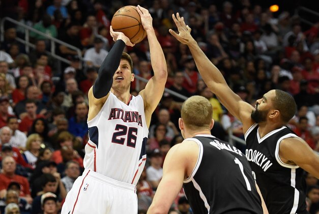 Apr 19, 2015; Atlanta, GA, USA; Atlanta Hawks guard Kyle Korver (26) shoots a three point shot against the Brooklyn Nets during the second half in game one of the first round of the NBA Playoffs at Philips Arena. The Hawks defeated the Nets 99-92. Mandatory Credit: Dale Zanine-USA TODAY Sports