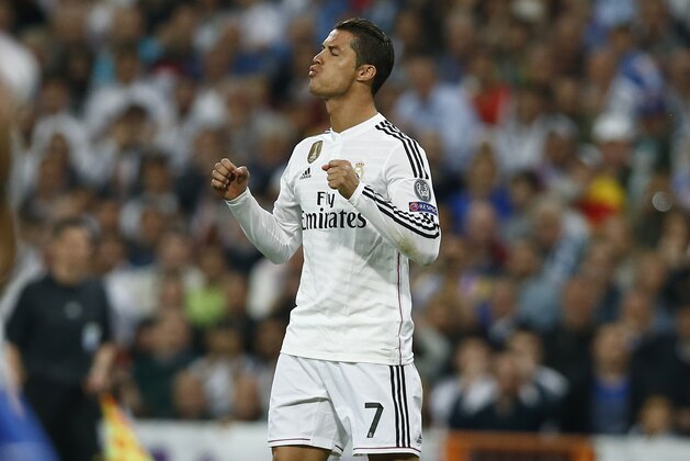 Real Madrid's Cristiano Ronaldo reacts during the second leg quarterfinal Champions League soccer match between Real Madrid and Atletico Madrid at Santiago Bernabeu stadium in Madrid, Spain, Wednesday, April 22, 2015. (AP Photo/Andres Kudacki)