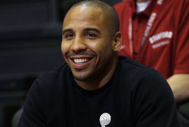 FILE - In this Feb. 20, 2014, file photo,  Boxer Andre Ward watches the first half of an NCAA college basketball game between Stanford and Southern Calif.,  in Stanford, Calif. Super middleweight champion Andre Ward says he nearly retired several times during the past three years while fighting with his promoter. After signing with Jay Z's Roc Nation Sports this month, the unbeaten boxer is eager to capitalize on the fondness created by his ring absence. (AP Photo/Marcio Jose Sanchez, File)