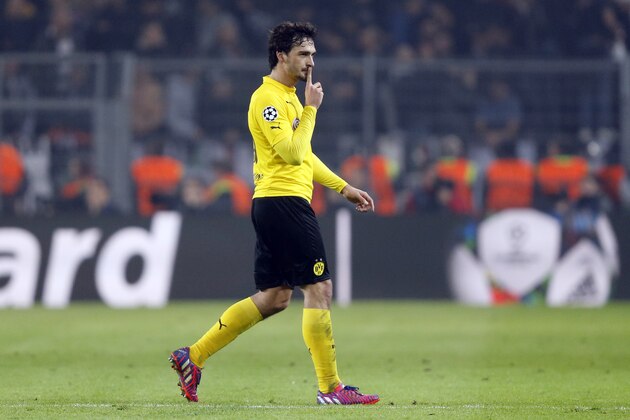 Dortmund's Mats Hummels gestures during the Champions League round of 16 second leg soccer match between Borussia Dortmund and Juventus Turin on Wednesday, March 18, 2015 in Dortmund, Germany. (AP Photo/Frank Augstein)