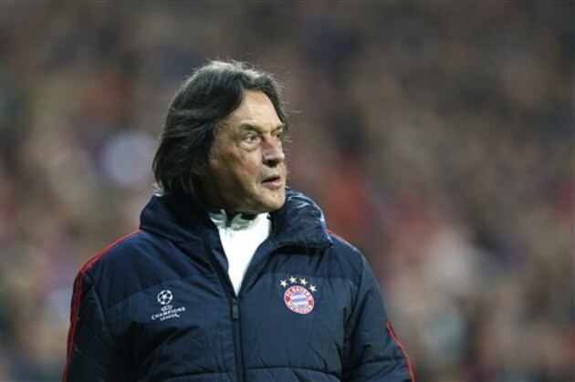 FILE - In this March 12, 2014 file photo Bayern team doctor Hans-Wilhelm Mueller-Wohlfahrt watches the Champions League round of 16 second leg soccer match between FC Bayern Munich and FC Arsenal in Munich, Germany. Mueller-Wohlfahrt stepped down as team docter Thursday, April 16, 2015 after nearly 40 years with the club.   (AP Photo/Matthias Schrader, file)