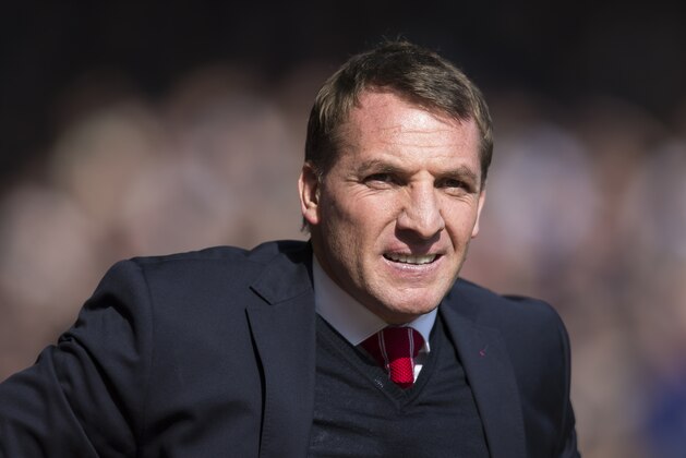 Liverpool's manager Brendan Rodgers takes to the touchline before his team's English Premier League soccer match between Liverpool and Manchester United at Anfield Stadium, Liverpool, England, Sunday, March 22, 2015. (AP Photo/Jon Super)