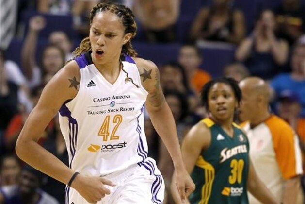 FILE - In this June 3, 2014, file photo, Phoenix Mercury's Brittney Griner (42) shouts in celebration after scoring against the Seattle Storm during the first half of a WNBA basketball game  in Phoenix. After a difficult first season in the WNBA, the former Baylor star is blossoming into the player everyone thought she would be. (AP Photo/Ross D. Franklin, File)