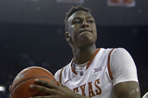 Texas forward Myles Turner rebounds the ball during the second half of an NCAA college basketball game against Kansas State, Saturday, March 7, 2015, in Austin, Texas.  (AP Photo/Michael Thomas)