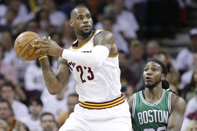 Cleveland Cavaliers' LeBron James (23) looks to pass against Boston Celtics' Jae Crowder in a first round NBA playoff basketball game Sunday, April 19, 2015, in Cleveland. (AP Photo/Tony Dejak)