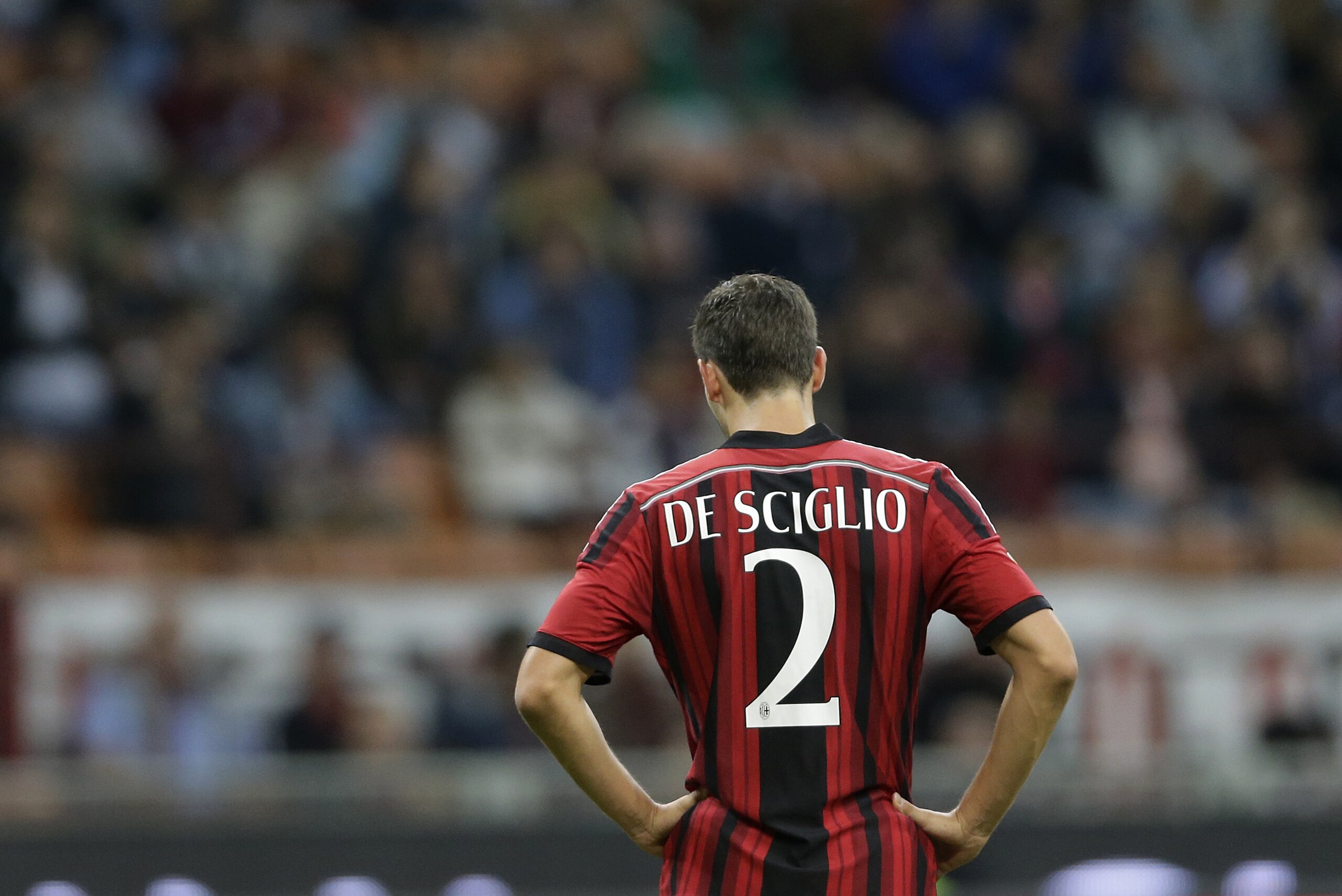 AC Milan's Mattia De Sciglio stands during the Serie A soccer match between AC Milan and Chievo at the San Siro stadium in Milan, Italy, Saturday, Oct. 4, 2014. (AP Photo/Antonio Calanni)