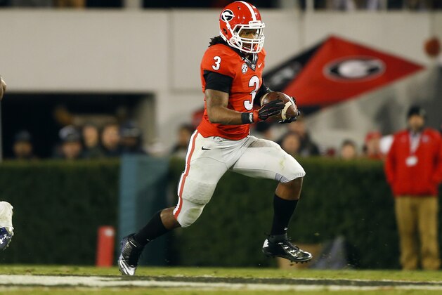 Georgia running back Todd Gurley (3) breaks into the open against Auburn in the second half of an NCAA college football game Saturday, Nov. 15, 2014, in Athens, Ga. (AP Photo/John Bazemore)
