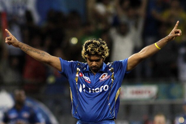 Lasith Malinga of Mumbai Indians celebrates the dismissal of Owais Shah of Rajasthan Royals  during their Indian Premier League (IPL) cricket match in Mumbai, India, Wednesday, April 11, 2012. (AP Photo/Rajanish Kakade)