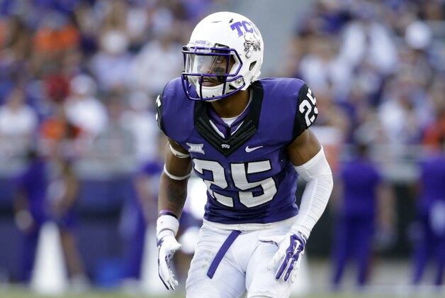TCU cornerback Kevin White (25) defends against Oklahoma State during an NCAA college football game, Saturday, Oct. 18, 2014, in Fort Worth, Texas. (AP Photo/Tony Gutierrez)