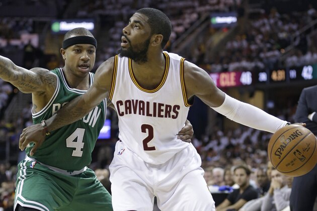Cleveland Cavaliers' Kyrie Irving (2) drives past Boston Celtics’ Isaiah Thomas (4) during the first round NBA playoff basketball game Sunday, April 19, 2015, in Cleveland. (AP Photo/Tony Dejak) Cleveland Cavaliers' Kyrie Irving (2) drives past Boston Celtics’ Isaiah Thomas (4) during the first round NBA playoff basketball game Sunday, April 19, 2015, in Cleveland. (AP Photo/Tony Dejak)