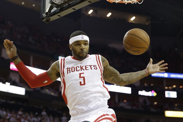 Houston Rockets' Josh Smith dunks during the second half of Game 2 in an NBA basketball first-round playoff series against the Dallas Mavericks, Tuesday, April 21, 2015, in Houston. (AP Photo/David J. Phillip)