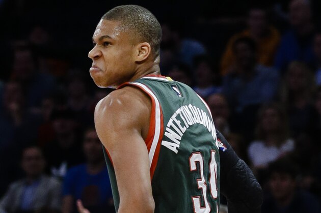 Milwaukee Bucks forward Giannis Antetokounmpo reacts after dunking during the first half of an NBA basketball game against the New York Knickson  Friday, April 10, 2015, in New York.  (AP Photo/Frank Franklin II)