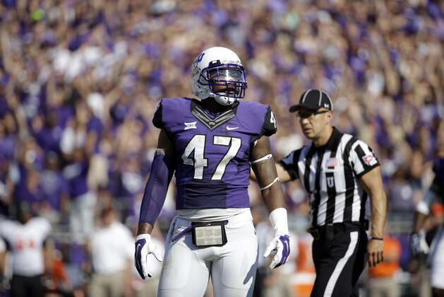 TCU linebacker Paul Dawson (47) stands on the field looking to the sideline during the first half of an NCAA college football game against Oklahoma State, Saturday, Oct. 18, 2014, in Fort Worth, Texas. (AP Photo/Tony Gutierrez)
