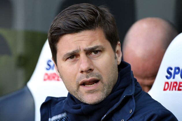 Tottenham Hotspur's manager Mauricio Pochettino awaits the start of their English Premier League soccer match between Newcastle United and Tottenham Hotspur at St James' Park, Newcastle, England, Sunday, April, 19, 2015. (AP Photo/Scott Heppell)