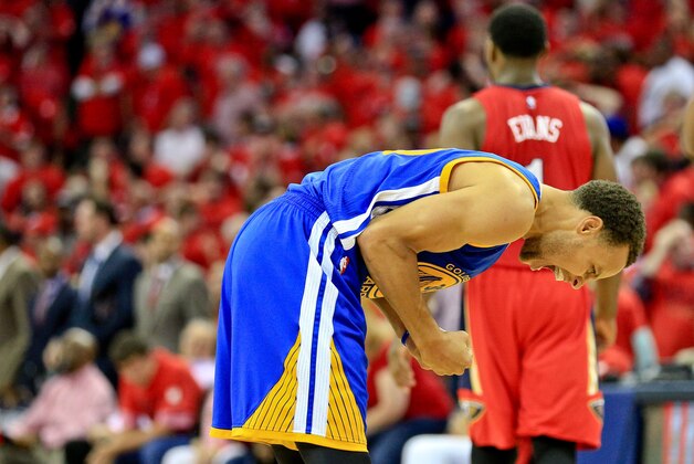 Apr 23, 2015; New Orleans, LA, USA; Golden State Warriors guard Stephen Curry (30) celebrates after a three point basket forced the game into overtime in game three of the first round of the NBA Playoffs at  the Smoothie King Center. The Warriors defeated the Pelicans 123-119 in overtime. Mandatory Credit: Derick E. Hingle-USA TODAY Sports