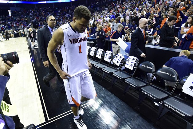 Mar 22, 2015; Charlotte, NC, USA; Virginia Cavaliers guard Justin Anderson (1) walks off the court after the game against the Michigan State Spartans in the third round of the 2015 NCAA Tournament at Time Warner Cable Arena. Michigan State won 60-54. Mandatory Credit: Bob Donnan-USA TODAY Sports