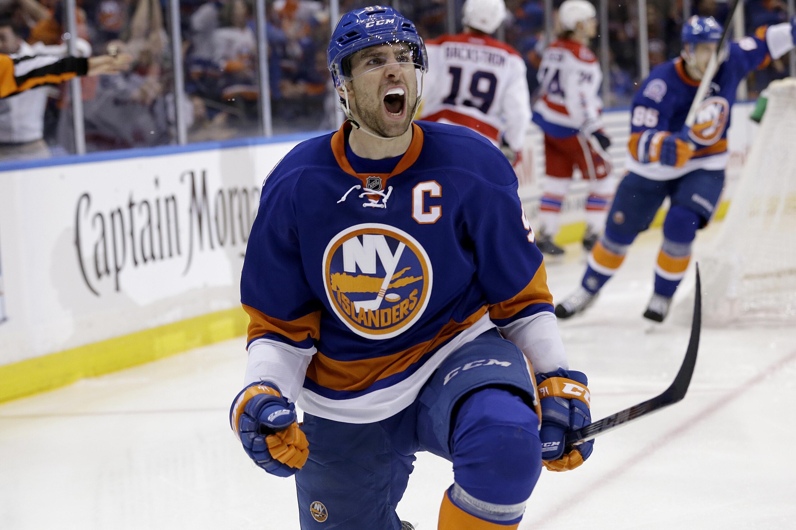 New York Islanders' John Tavares reacts after scoring the winning goal during the overtime period of Game 3 of a first-round NHL hockey playoff series against the Washington Capitals Sunday, April 19, 2015, in Uniondale, N.Y. The Islanders defeated the Capitals 2-1. (AP Photo/Seth Wenig)