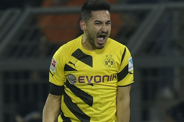 Dortmund's Ilkay Gundogan celebrates his goal during the German Bundesliga soccer match between Borussia Dortmund and TSG Hoffenheim in Dortmund,  Germany, Friday, Dec. 5, 2014. (AP Photo/Martin Meissner)