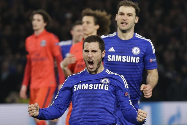 Chelsea's Eden Hazard celebrates after scoring his side's second goal during the Champions League round of 16 second leg soccer match between Chelsea and Paris Saint Germain at Stamford Bridge stadium in London, Wednesday, March 11, 2015. (AP Photo/Matt Dunham)