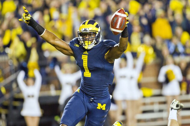 Michigan wide receiver Devin Funchess (1) celebrates a touchdown in the first quarter of an NCAA college football game against Penn State in Ann Arbor, Mich., Saturday, Oct. 11, 2014. Michigan won 18-13. (AP Photo/Tony Ding)