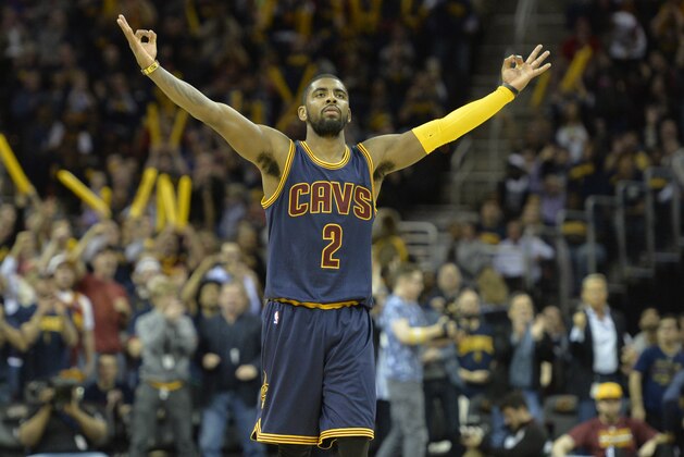 Apr 5, 2015; Cleveland, OH, USA; Cleveland Cavaliers guard Kyrie Irving (2) celebrates in the fourth quarter against the Chicago Bulls at Quicken Loans Arena. Mandatory Credit: David Richard-USA TODAY Sports